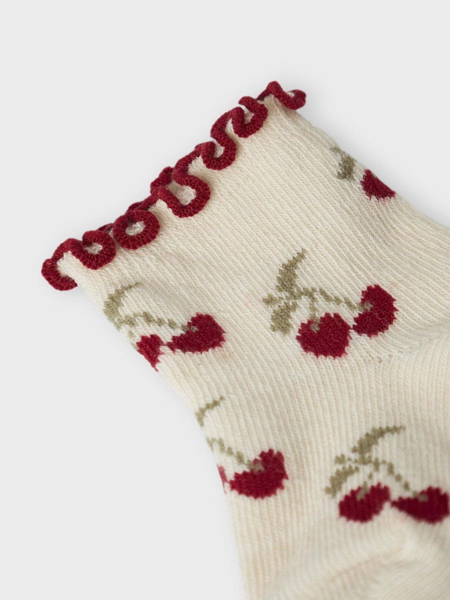Lil Atelier | Babysocken mit Kirschmotiven