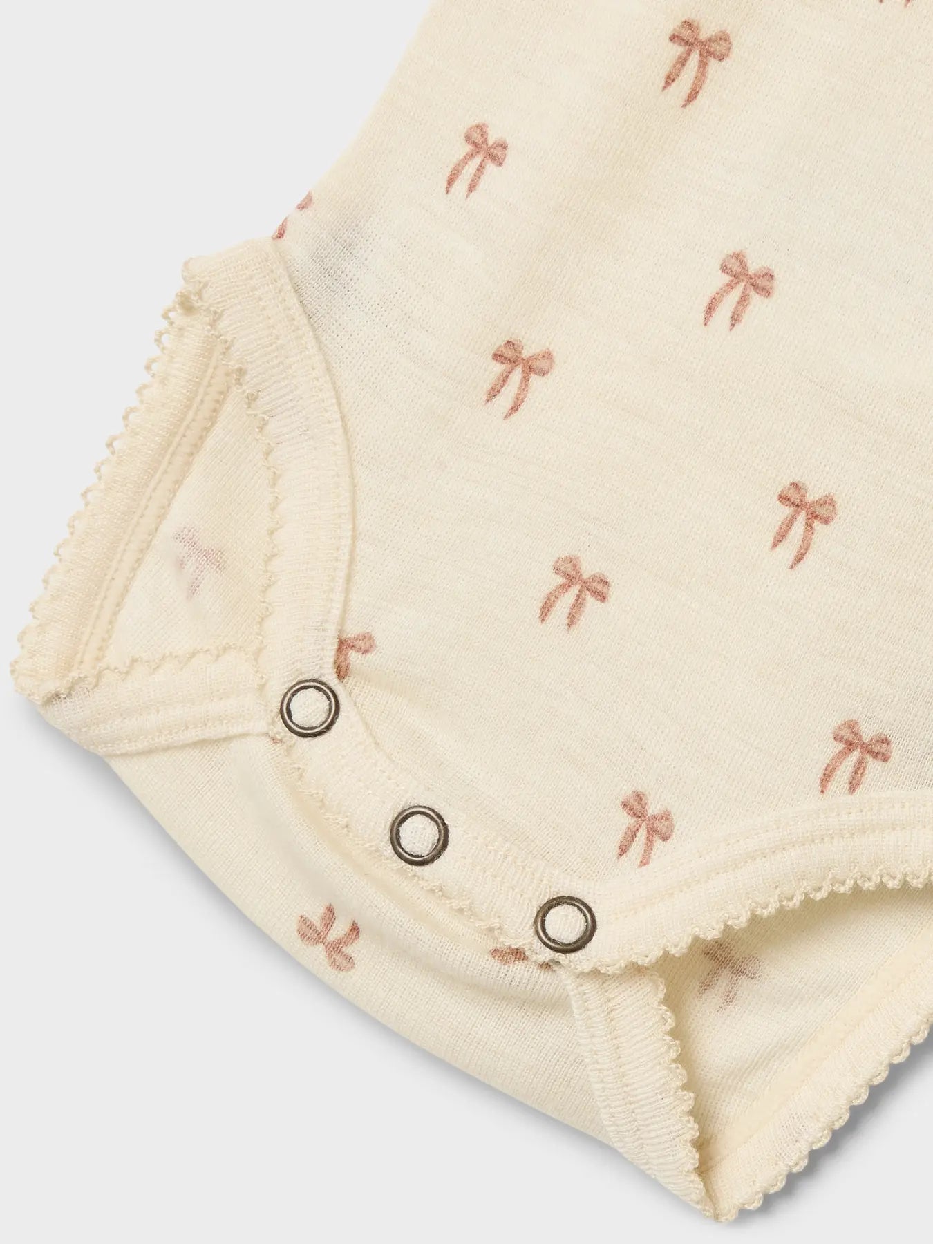 Lil Atelier | Romper Nalu wol strikjes