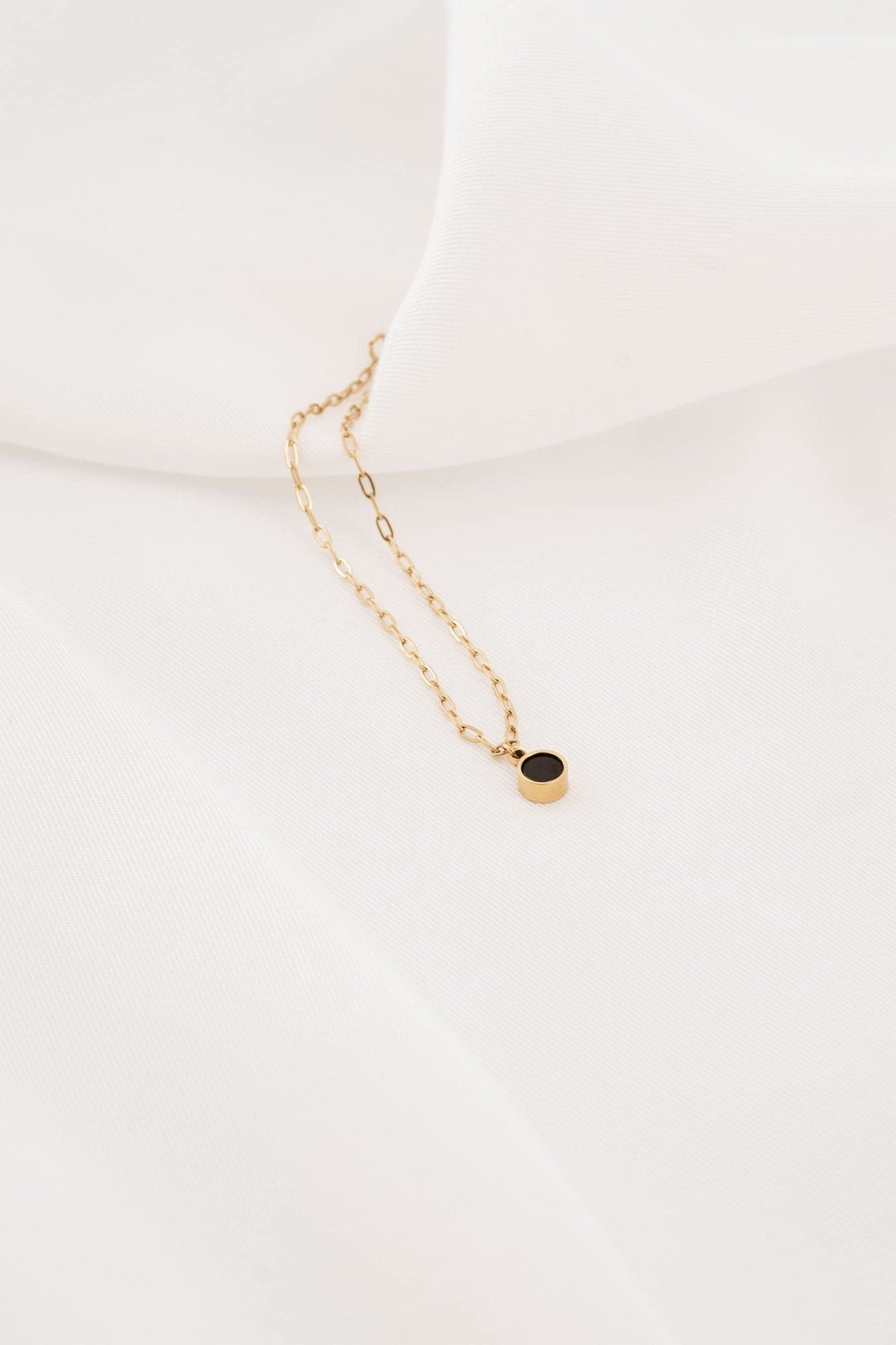 Zusss | Schakelarmband met muntje zwart/goud