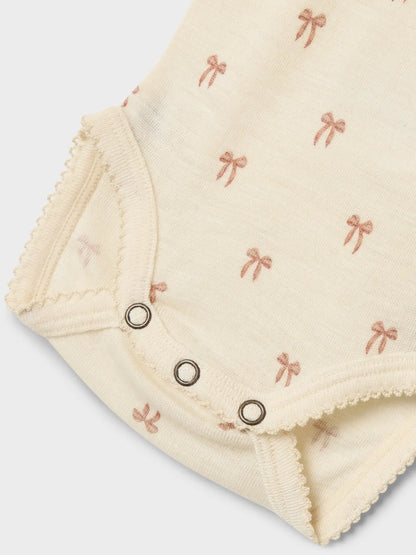 Lil Atelier | Romper Nalu wol strikjes